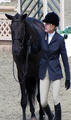 Avenue Blue with proud owner and rider Caroll Hoffman on their way receiving their earned ribbon.