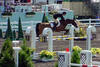 and Chris in the \"Gold Cup\" Grand Prix at the prestigious horse show \"Where Champions Meet\"